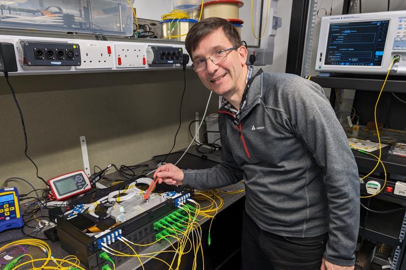 Dr Ian Phillips with the wavelength management device