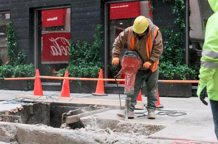 North American fibre optic network operator, Lumen workers drill concrete in Chicago