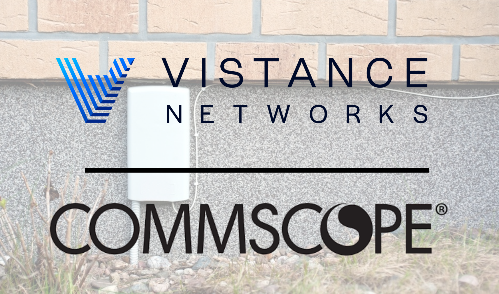 White ftth box on grey wall. Installation of fibre optic internet outside of the building.