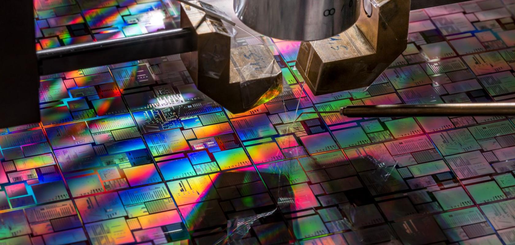 Automated wafer level electro-optical probe testing of silicon photonics