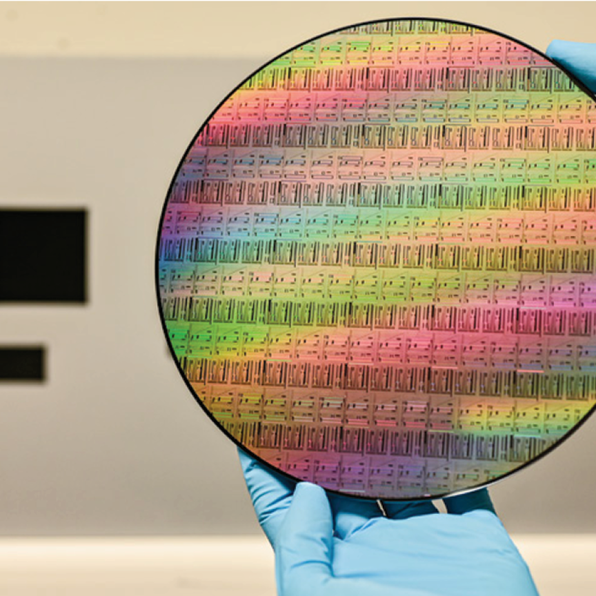 A high-resolution view of a 200mm silicon-on-insulator (SOI) wafer featuring photonic integrated circuits, developed through the Ligentec X-Fab photonics partnership for TFLN scaling